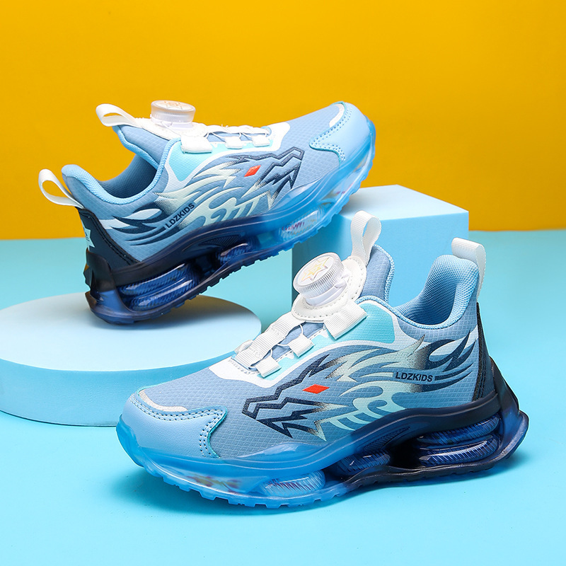 Venta al por mayor de zapatos para niños de mediana edad, zapatos con botones giratorios, modelos de primavera y otoño para estudiantes, una pieza de deportes, red de fideos para niños transpirable