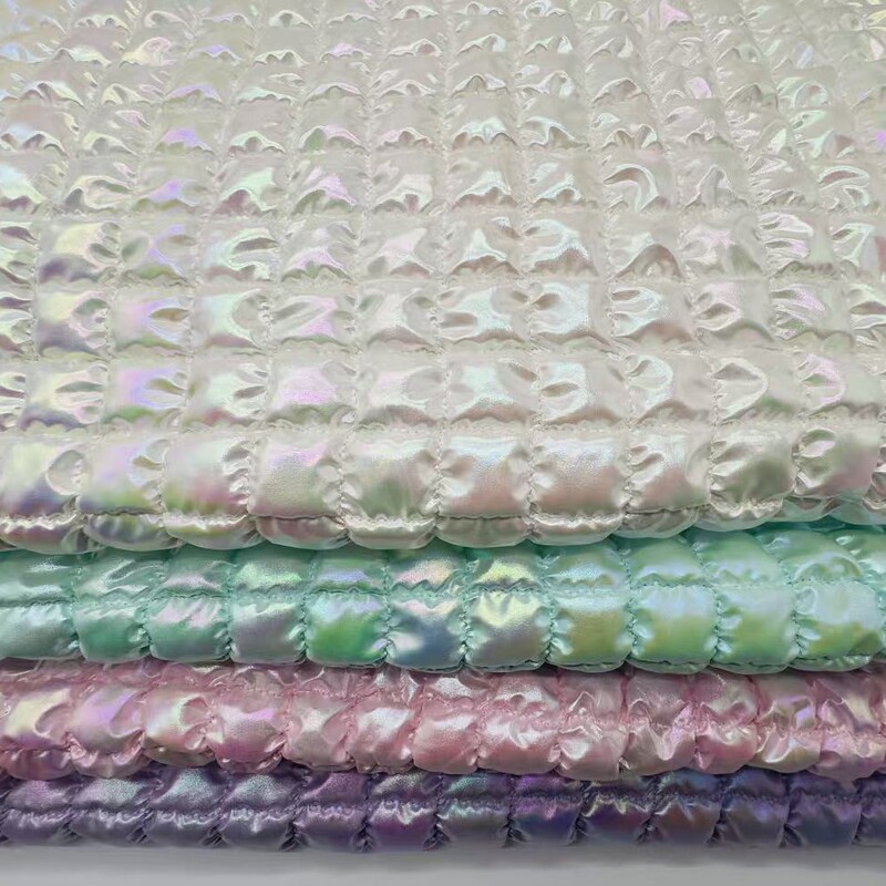 Spring Yarn Gold-Stamped Iridescent Quilted Stretch Fabric 3.3 Regular Pattern Fabric with Cotton Lining for Clothing, Cloud Bags, and Notebook Covers Spring Yarn Gold-Stamped Iridescent Quilted Stretch Fabric 3.3 Regular Pattern Fabric with Cotton Lining for Clothing, Cloud Bags, and Notebook Covers