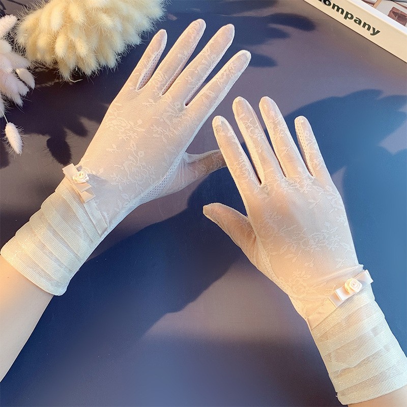Guantes de protección solar primavera y verano encaje arco guantes de pantalla táctil de conducción de las mujeres transpirable al aire libre protección solar guantes de equitación