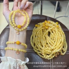 新疆黄玉石英岩玉多圈手链蜜蜡色黄玛瑙滴油金鱼莲花吊坠厂家批发