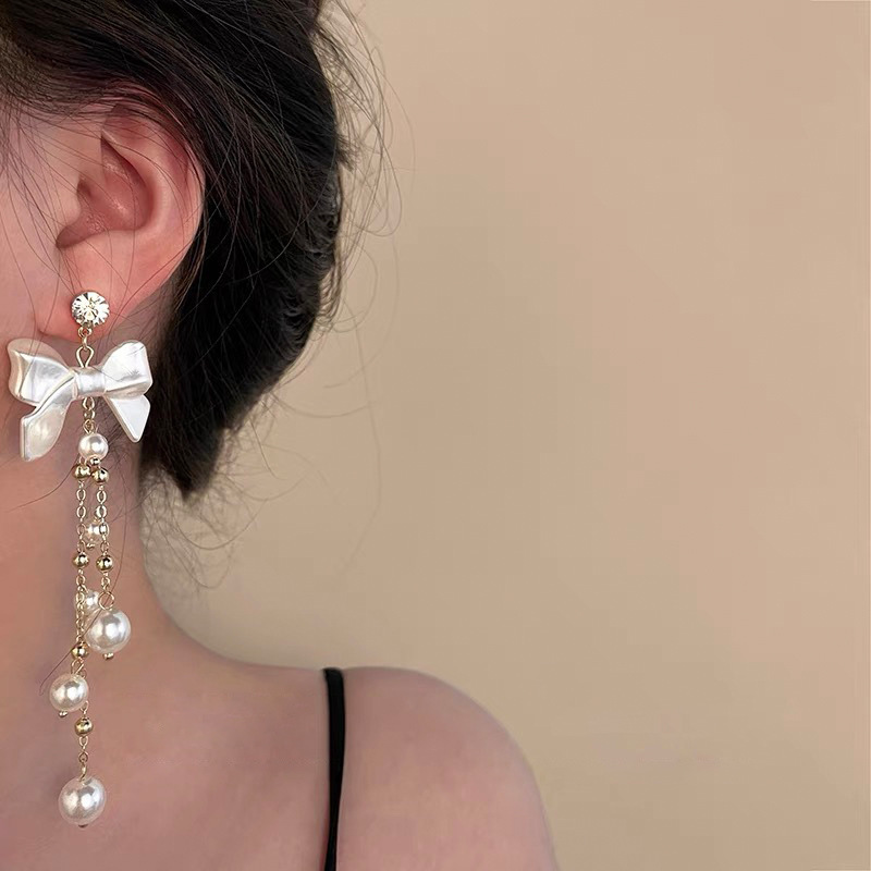 銀の針の花の蝶結びの真珠のフリンジのイヤリングの優雅な百合のイヤリングの軽い豪華な高級感のイヤリングの女性の卸売り|undefined