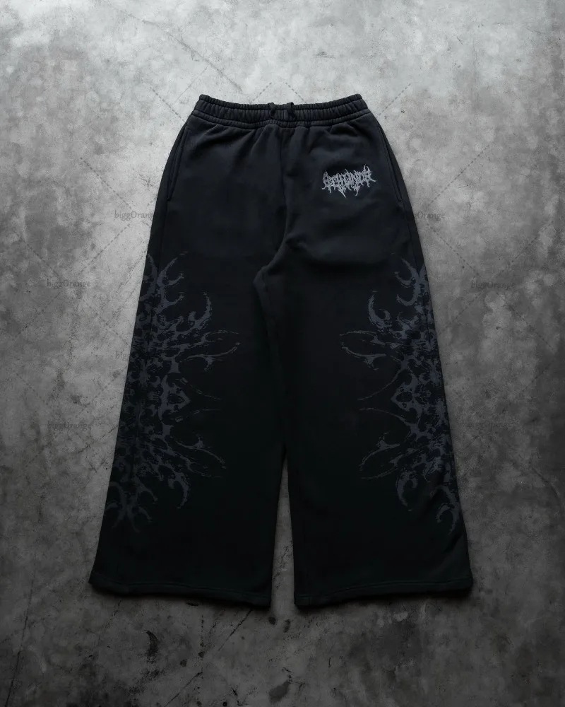 Europa y Estados Unidos transfronterizos estadounidenses tendencia hip-hop personalidad callejera pull-out pantalones casuales de moda impresa pantalones rectos sueltos