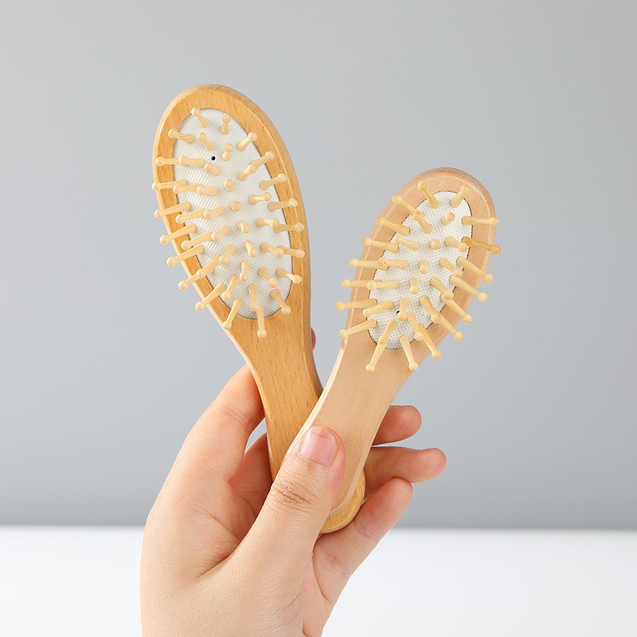 En stock de bambú Hemu peine cuidado del cabello mini bolsa de aire peine portátil de alta calidad pequeño peine de masaje para el cabello sin daño