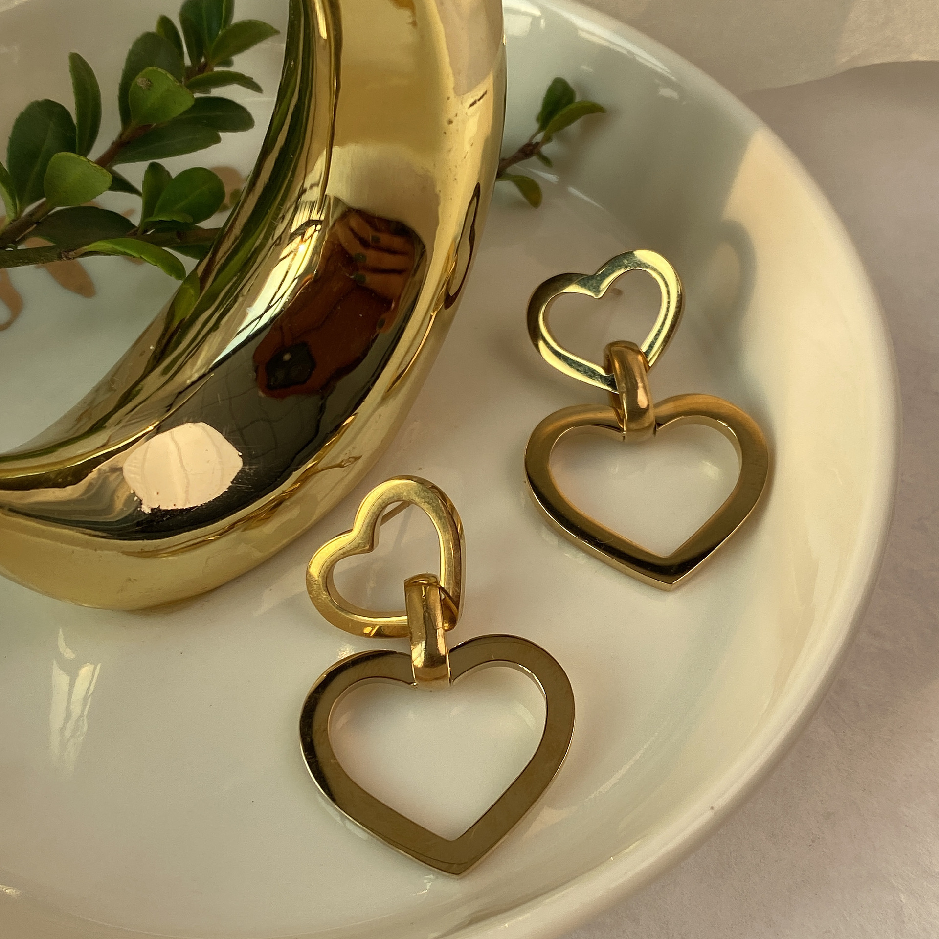 Golden earrings heart shaped