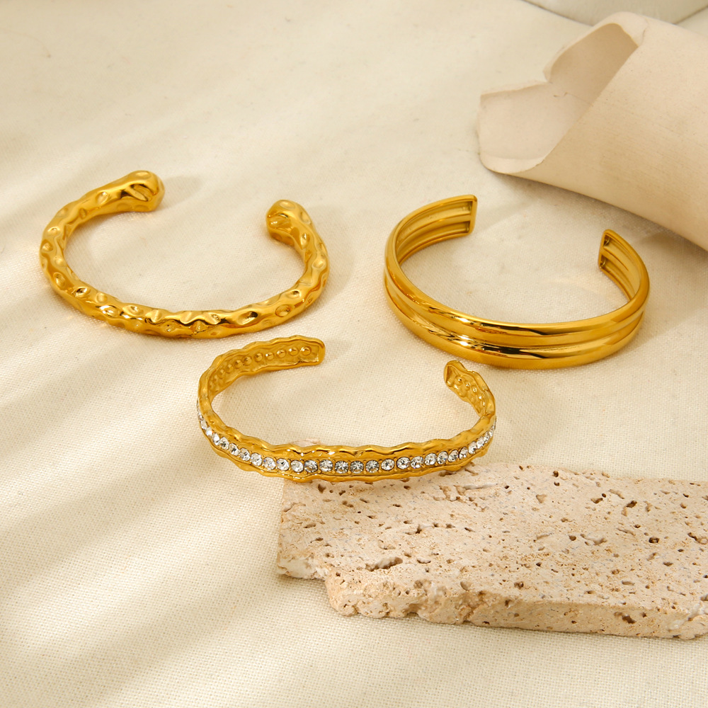 18g Weight 0.03µm-0.05µm Gold Plating Thickness PVD Coated Gold Plating Process 18K Real Gold Plated Plating Material Zircon Inlay Material Bangle Classification 1 Piece Quantity Casual, Holiday, Daily, Street Occasion 304 Stainless Steel Material Geometric Pattern Women's Gender Retro, Classic Style Style Mixed Metal, Plating, Hammered Craft Retro Classic Style Geometric 304 Stainless Steel 18K Gold Plated Bangle In Bulk 15