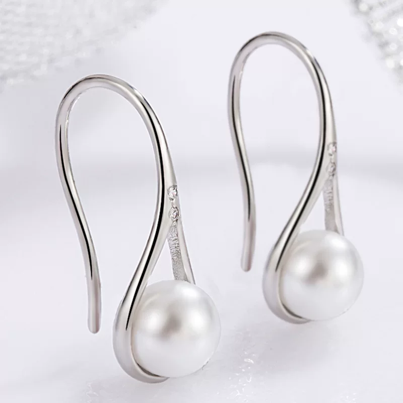 Earrings from pearl, for import, wholesale