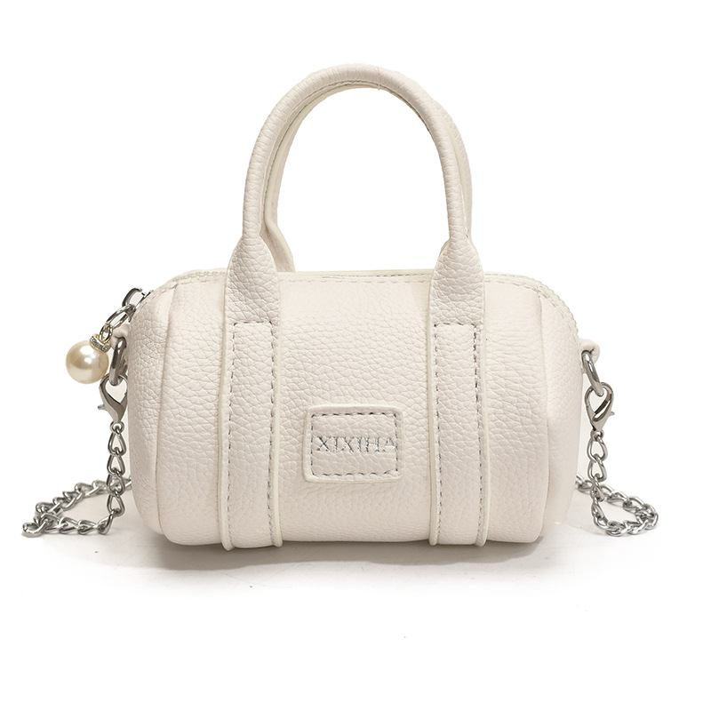 Coreano simple color sólido bolso de hombro para niños y niñas letras de aire extranjero mini bolso de bebé nuevo bolso de almohada para niños