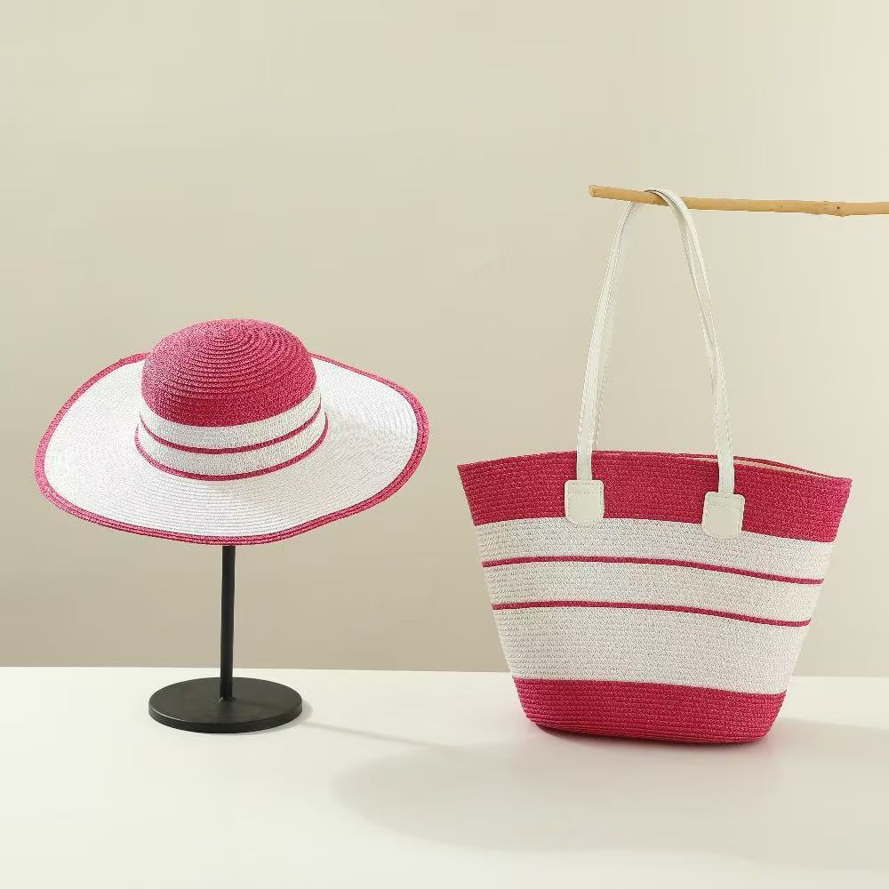 El nuevo bolso de sombrero de paja de verano tiene dos juegos de sombreros de sol de viaje al aire libre de alta gama de moda con bolsos de paja de temperamento.
