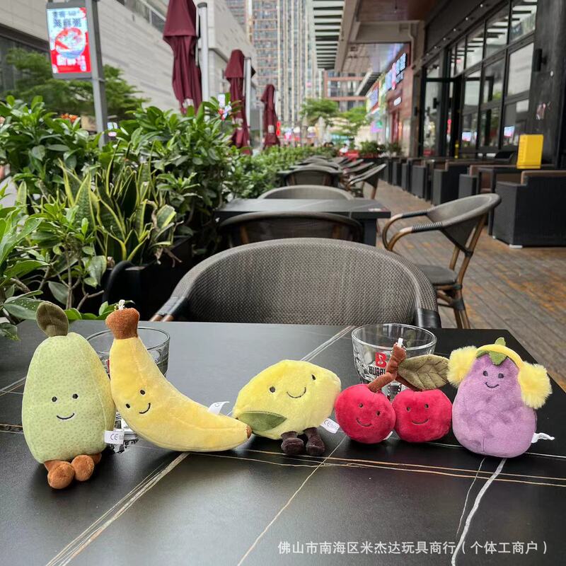 Spot Fun Vegetable and Fruit Headphones Eggplant Banana Lemon Cherry Pear Plush Doll Bag Pendant Baby Catching Machine