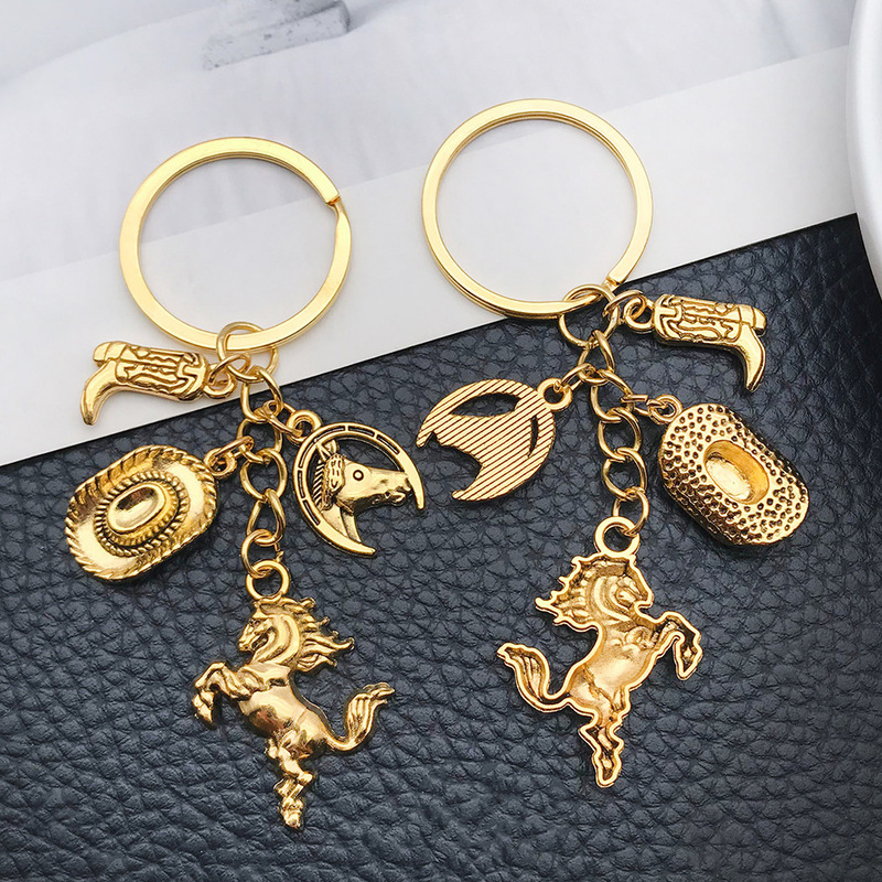Amazon Hot New Ancient Gold Simulation Western Cowboy Hat Boots Flaming Horse Keychain European and American Jewelry Keychain