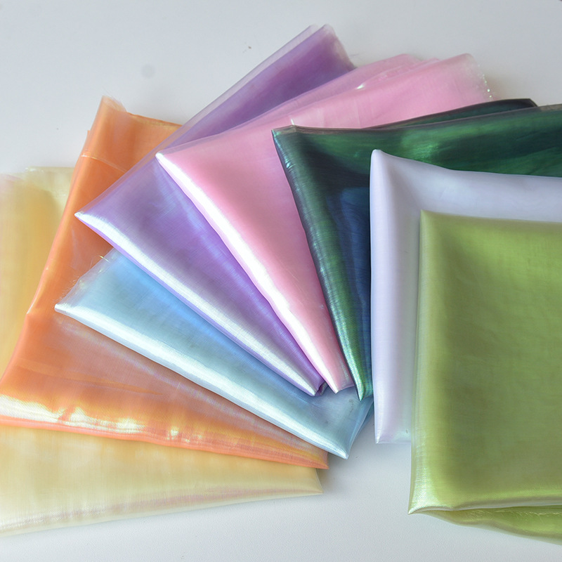 欧根纱亮网纱幻彩珠光纱平七彩镭射面料舞台婚庆饰品diy手工辅料