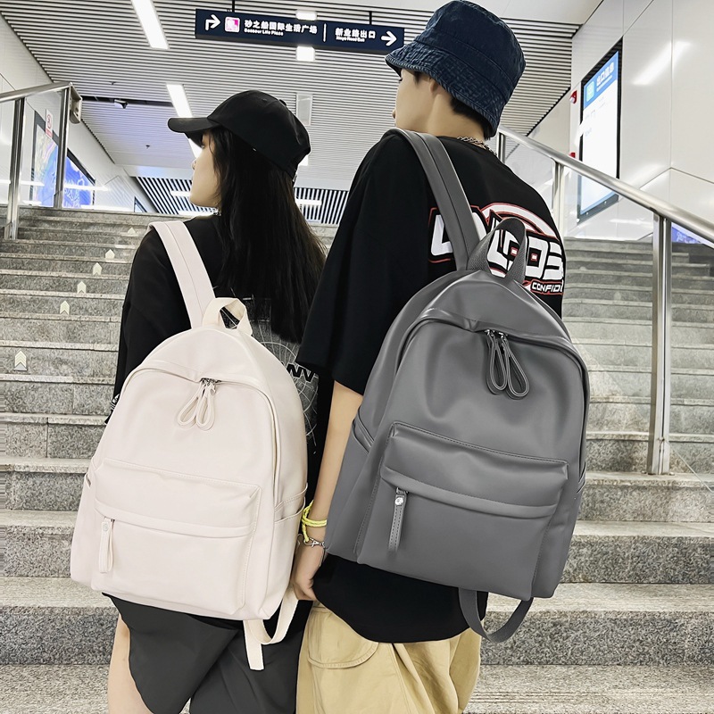 2022 nueva mochila escolar de cuero suave para estudiantes de secundaria mochila femenina simple casual moda mochila de viaje de gran capacidad para hombres