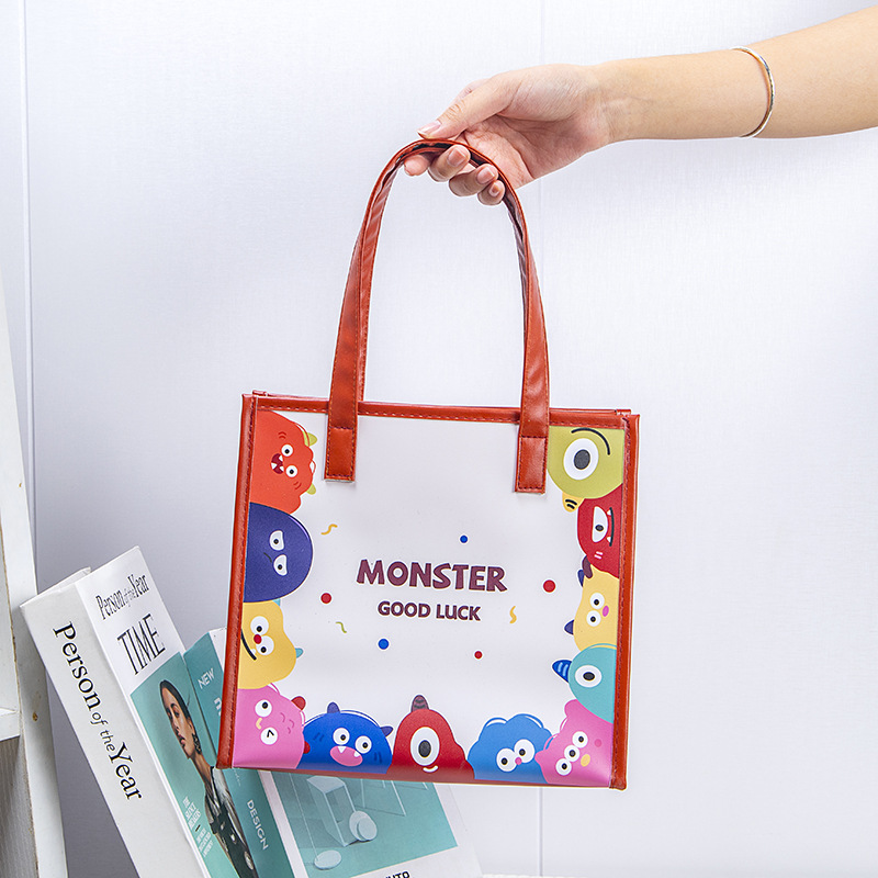 现货手提袋卡通好运怪兽防水大容量网红时尚学生袋伴手礼物礼品袋