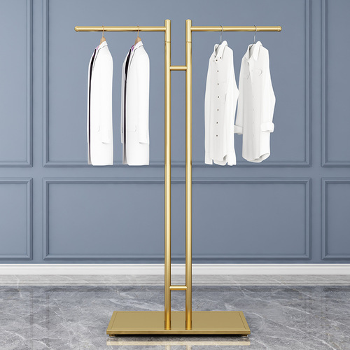 Clothing store display: freestanding island racks, men's and women's clothing racks, garment shelves, and kid's clothing hangers.
