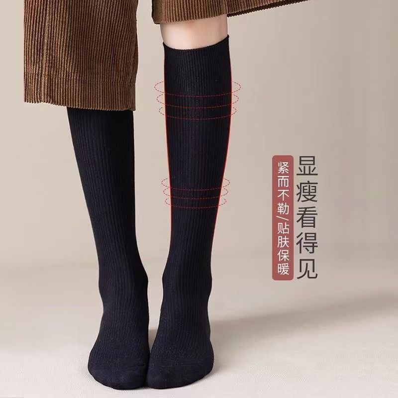 白いふくらはぎの靴下の子供の秋冬のストッキングは汗を吸います。|undefined