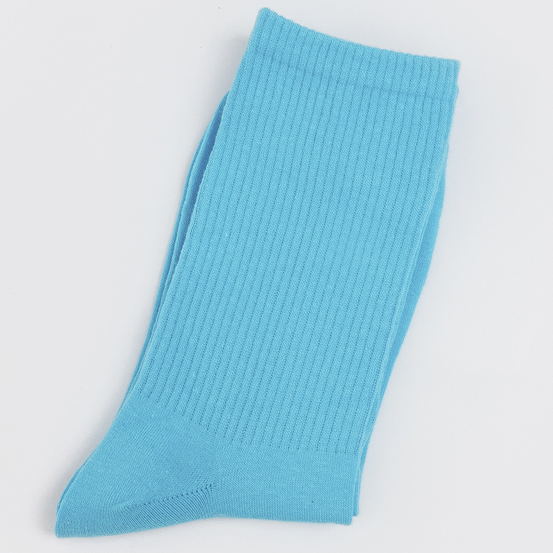 Calcetines de mujer para primavera y otoño, calcetines de algodón de color liso, versátiles y a la moda, calcetines holgados, calcetines de longitud media, calcetines deportivos que absorben el sudor, venta al por mayor.