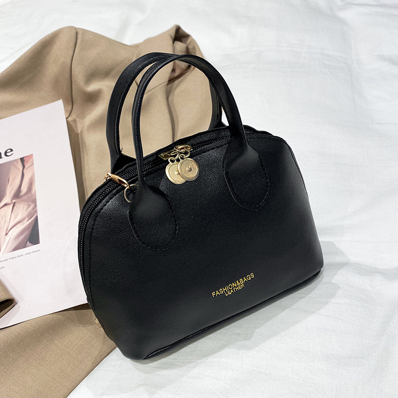 Bolso de comercio exterior transfronterizo mujer 2022 moda coreana impresión de hombro mochila bolso de mujer bolso de teléfono móvil al por mayor