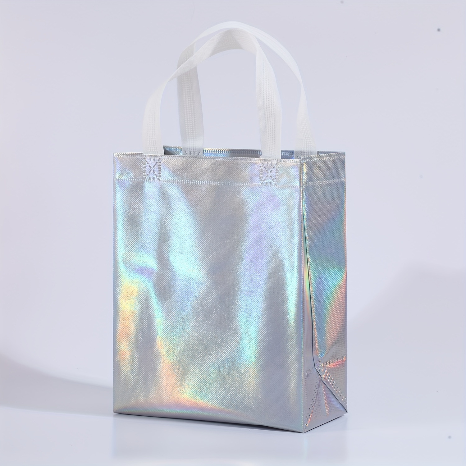 En stock nueva bolsa de regalo no tejida láser bolsa de regalo de boda bolsa de fiesta de comercio exterior logotipo imprimible