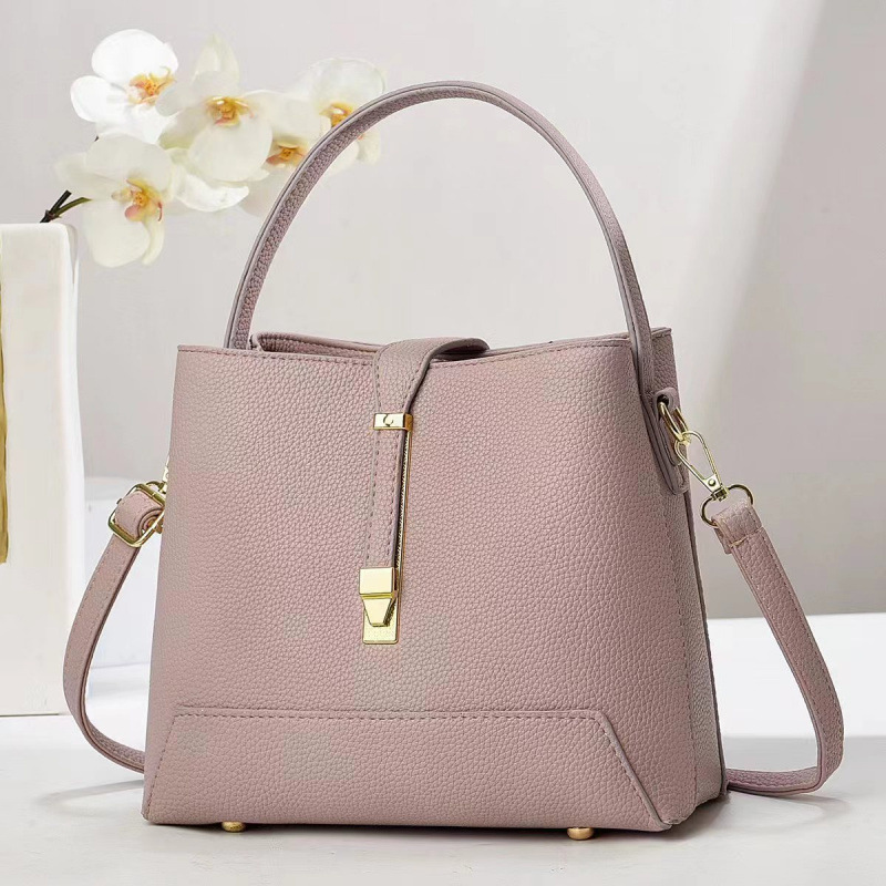 Fabricante bolsos de mujer 2025 nuevo bolsos de mano texturas coreanas de hombro de una sola forma de bolsos de cubo de mujer bolsos