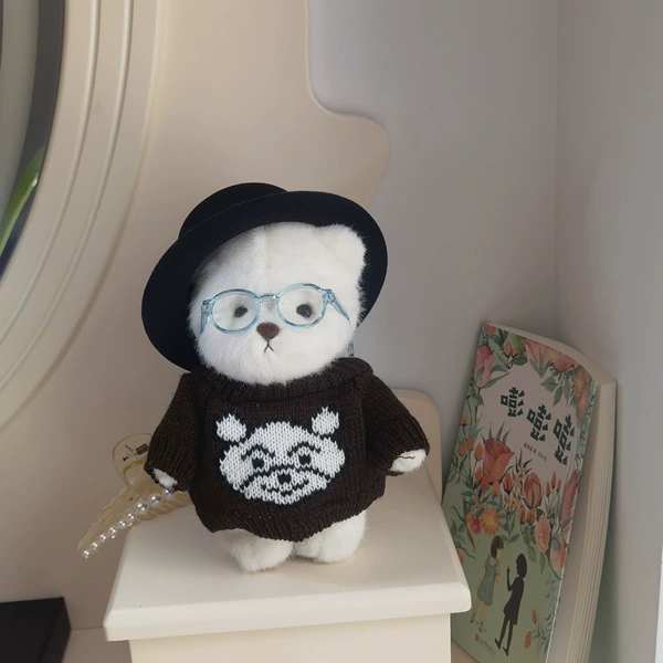 Brown sweater + black hat + glasses