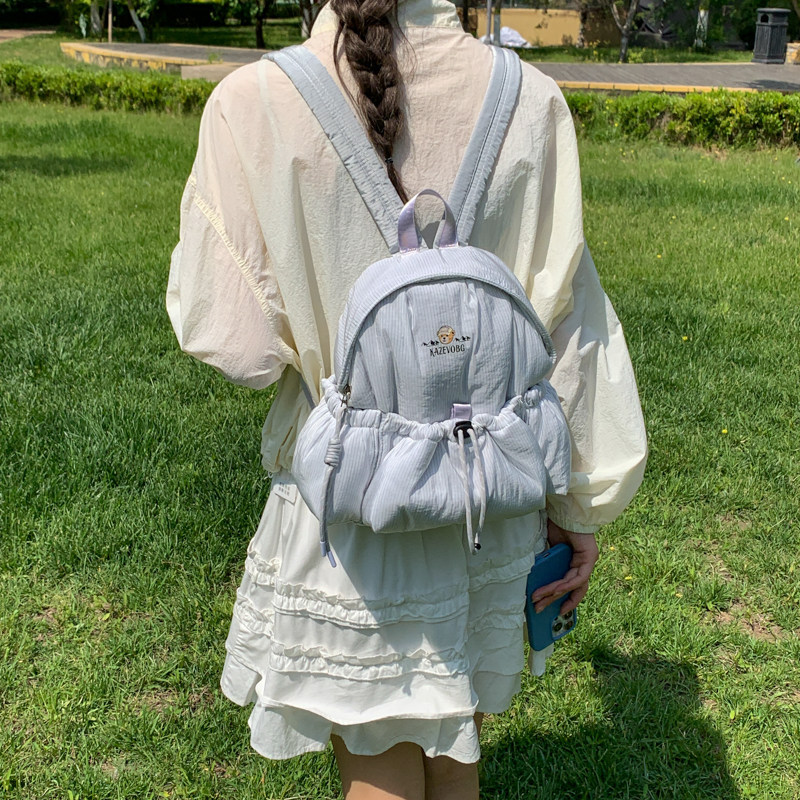 Nuevo estilo de viaje 2026 Bundokou mujer mochila funcional ocio impermeable cuerda de extracción al aire libre mochila de montaña de viento ligera