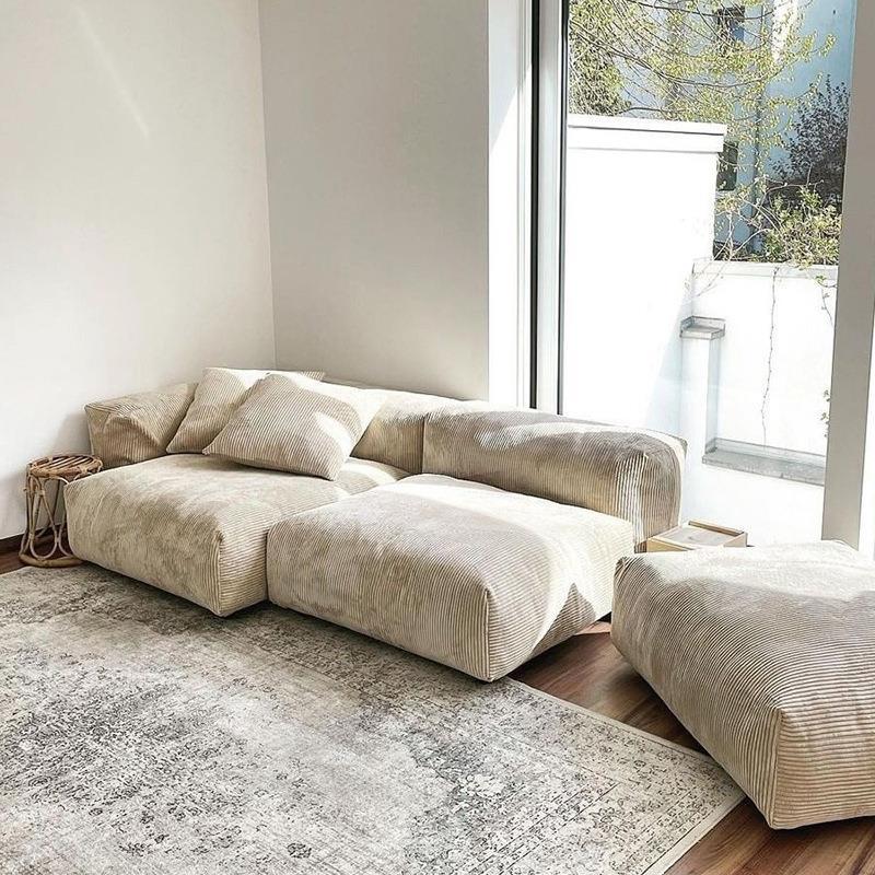 Sofá de tofu de viento de crema retrógrado minimalista diseñador de red de estilo silencioso sofá de sala de estar de tela de lana