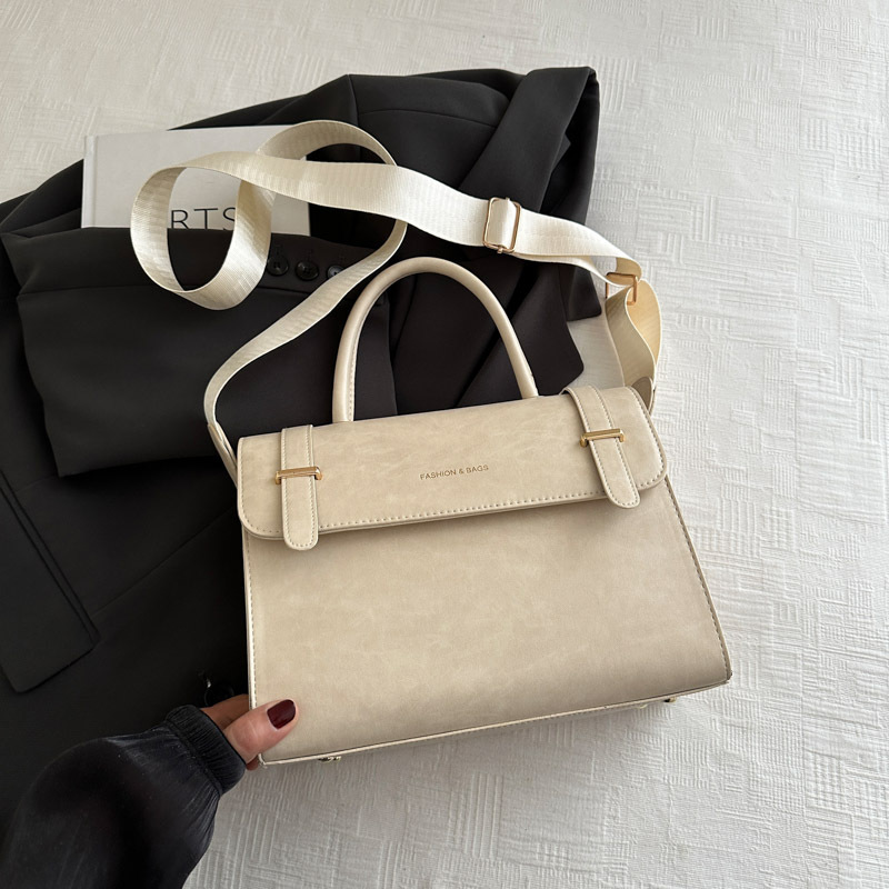 Bolso retro con textura de viajero 2024 invierno nuevo estilo salvaje temperamento ins bandolera de nicho bolso cuadrado pequeño mujer