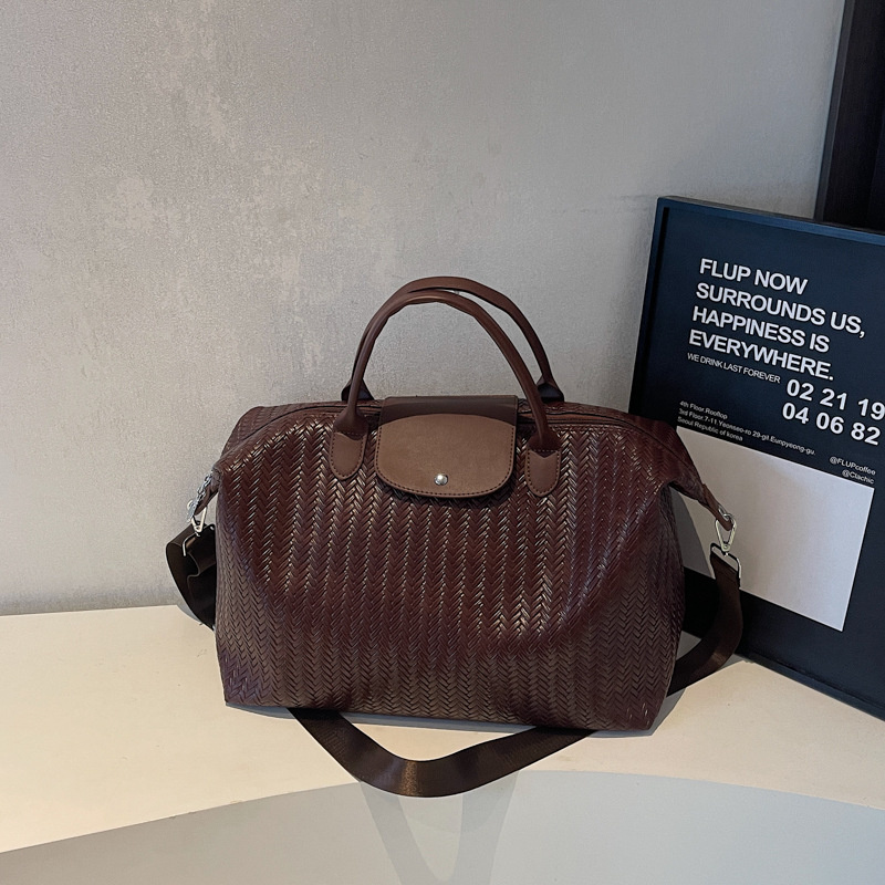 Bolsa de viaje de gran capacidad retro herringbone transfronteriza, bolsa de ejercicios deportivos al aire libre para mujeres, bolsa de hombro de un solo hombro.