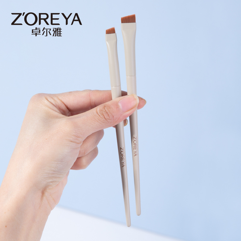 Zhuolya portátil maquillaje cepillo herramientas de belleza cabeza plana cepillo de cejas oblicuo ojo mentira hoja de gusano cepillo de ojos al por mayor