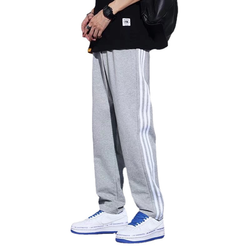 Pantalones de rayas japonesas primavera y otoño de los hombres de moda ins Pantalones deportivos rectos sueltos estilo coreano de moda Pantalones casuales a juego