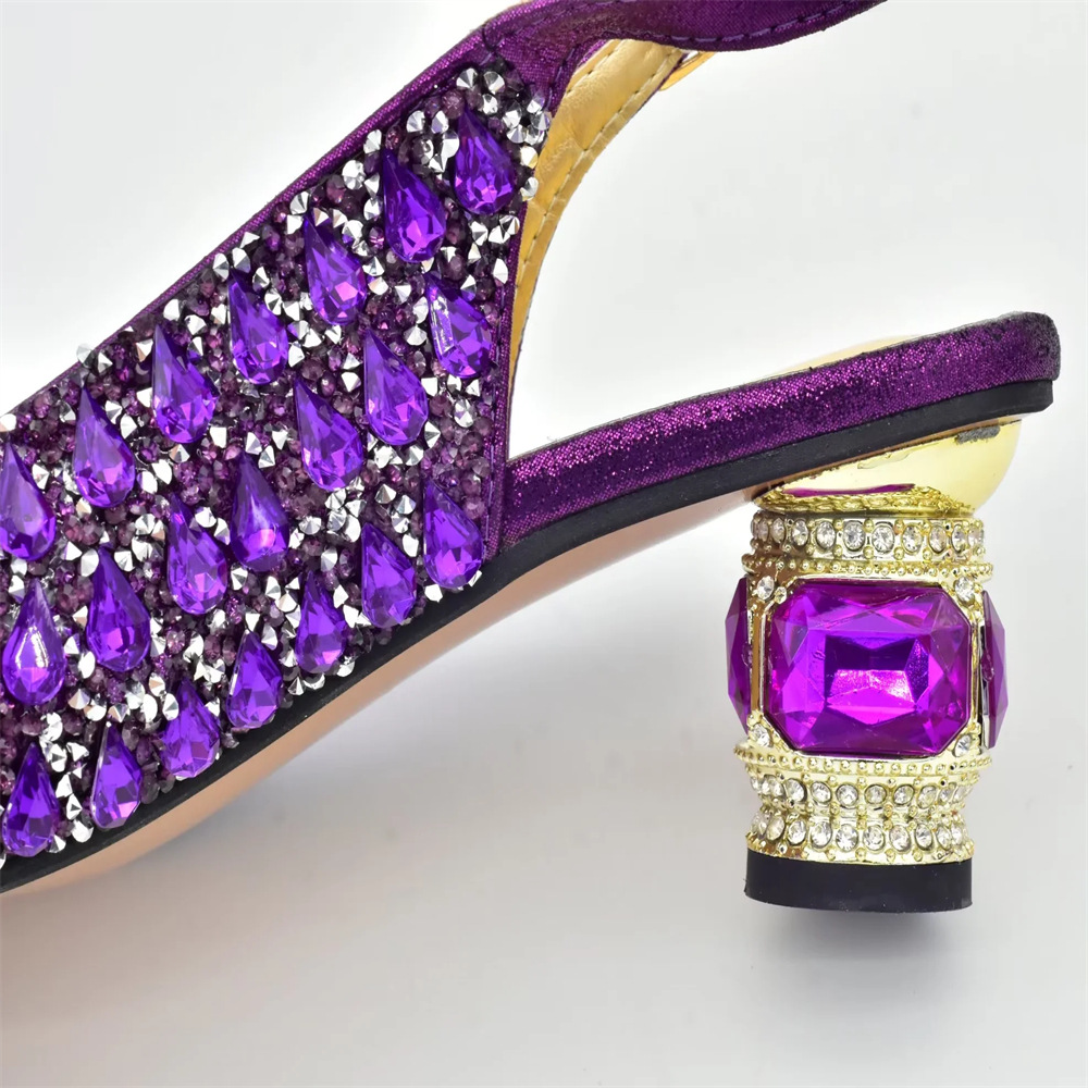 The party is paired with rhinestone round head fish mouth sandals and light hand bag set with large flash diamonds_voghion.com