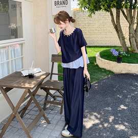 深蓝色高级感一整套穿搭女2025夏新款假两件短袖上衣阔腿裤两件套