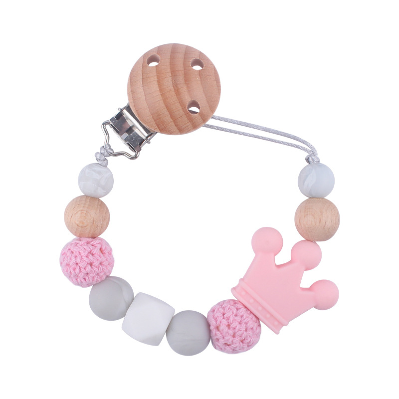 Suministros para bebés calmante clip de chupete de haya bebé anti-caída de la cadena de dibujos animados corona de silicona perlas mordedura molar chupete cadena