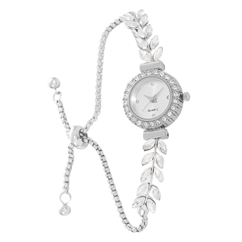 Nueva hoja de moda Correa fina diamante redondo reloj de mujer pull-out ajustable reloj de pulsera reloj de cuarzo de mujer al por mayor