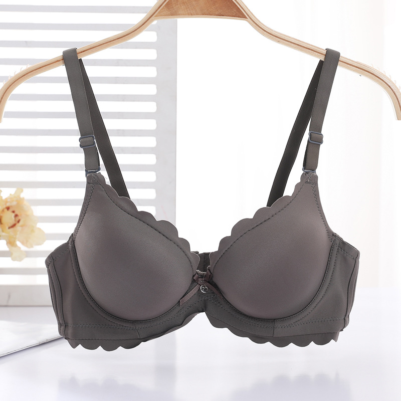 Fábrica de sujetadores de Shantou en stock brillante sin marcas de grosor pequeño sujetador de ropa interior para mujeres ajustable soporte superior para evitar caída