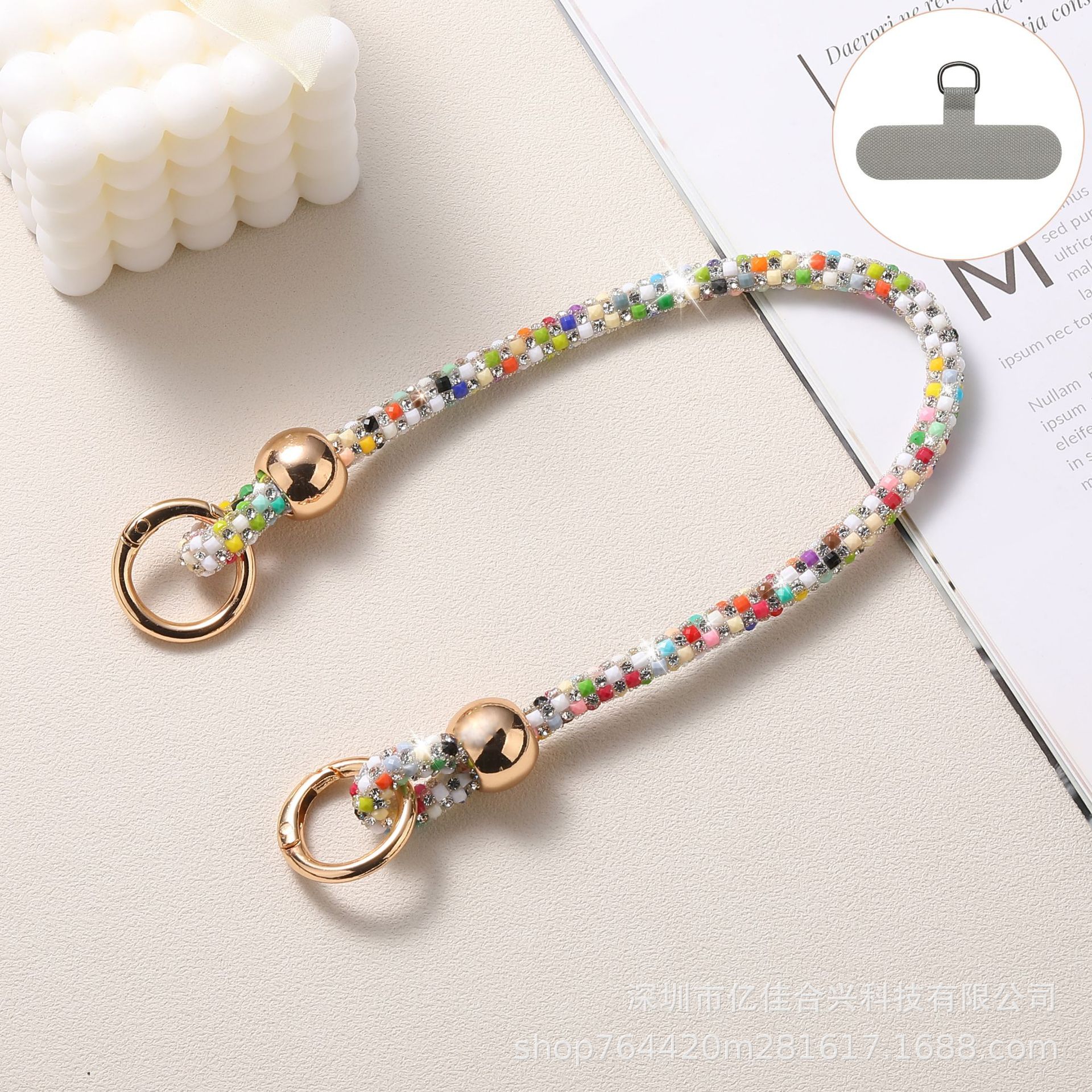 Estilo coreano ins cuentas redondas color diamante pulsera bolso colgante cadena de teléfono móvil al por mayor aplicable funda para teléfono móvil funda para auriculares nuevo