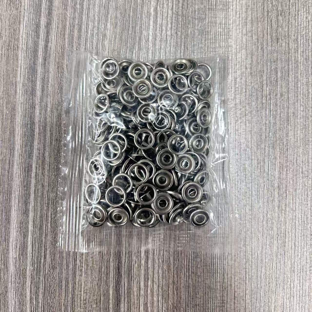 Pasando en el comercio electrónico de cinco dedos hebilla de cobre bebé trepa ropa de botón de acero inoxidable sin costura hebilla de garra ropa infantil DIY botón