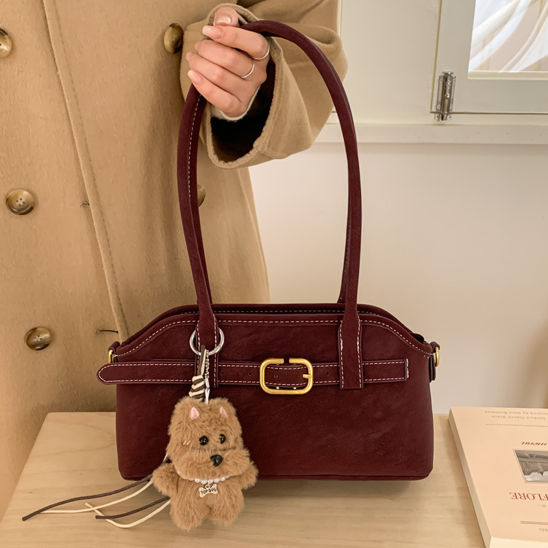 Bagos de hombro bajo la braza de nicho de alto nivel para mujeres otoño y invierno 2025, nuevo tipo de bolso de transporte de mano, bolso de moda