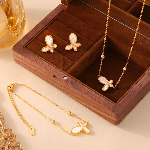 Elegant French-style jewelry set featuring a delicate, butterfly-shaped pendant with white shell inlay and a gentle, feminine design—crafted from titanium steel with gold-plated finish.