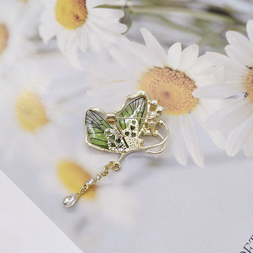 Cross-border butterfly brooch translucent rhinestone insect corsage high-end design pin clothing accessories wholesale