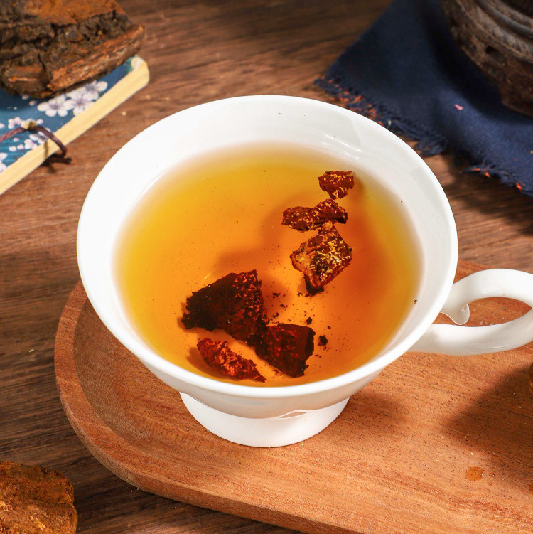 Chaga Mushroom Granules Hua Shu Rong 70g Jar Dried Inonotus obliquus Sclerotia for Daily Herbal Tea and Decoction in use