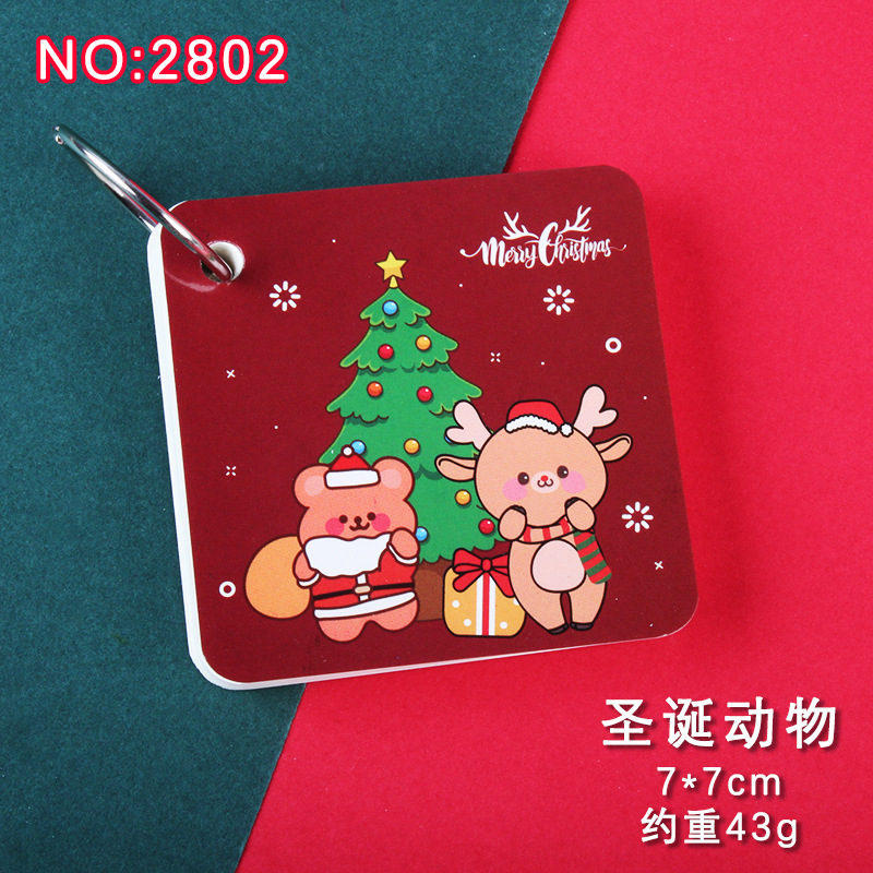 クリスマスの鉄の輪の本の環は本の学生の携帯ポケットのメモの付箋の空白の英語の単語のバインダーの本を掛けます。|undefined