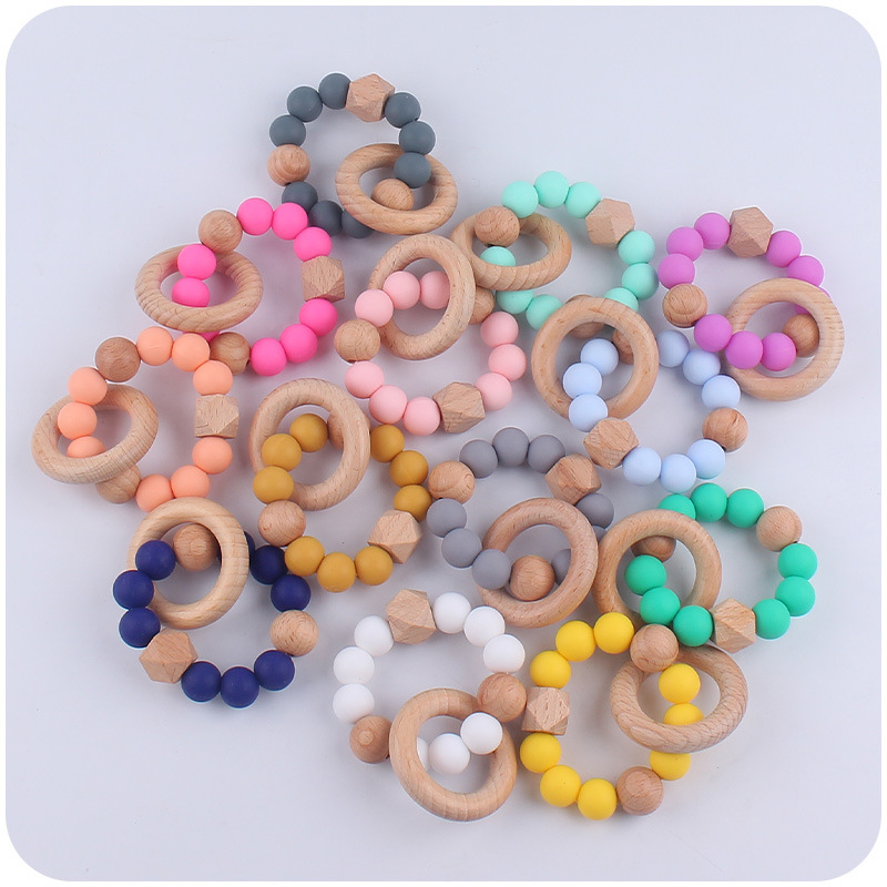 Nuevo bebé suministros de madera de haya anillo mordedor calmante bebé cuentas de silicona mordida molar pulsera mordedor juguete