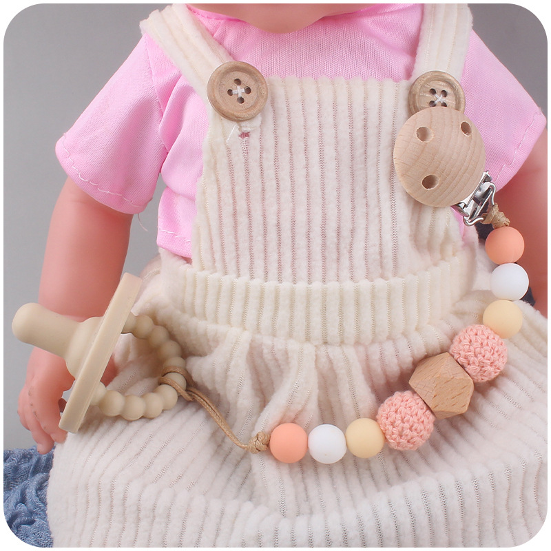 Nuevo bebé calmante Beech clip chupete cadena bebé creativo madera octogonal mordedura silicona molar anti-gota cadena