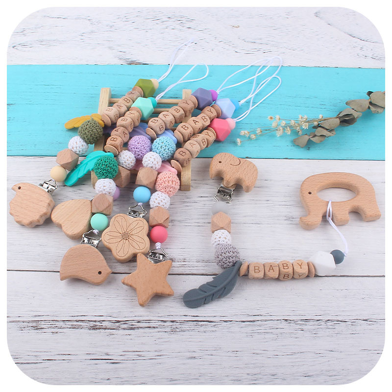Nuevo DIY nombre del bebé calmante silicona pluma chupete anti-gota cadena bebé juguete haya animal chupete clip