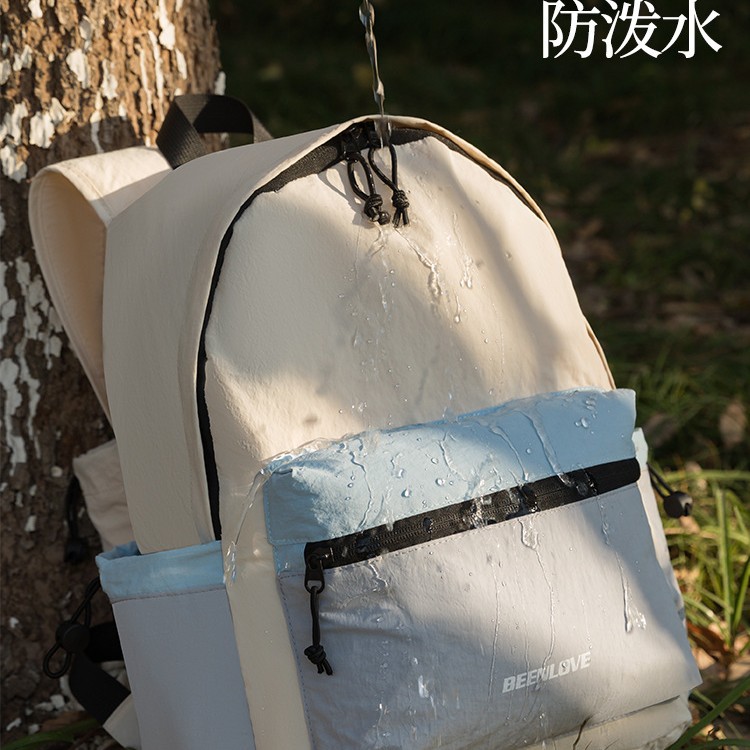 Diseño de contraste de color sensación de deporte al aire libre torre de sillo plegable mochila a prueba de agua de senderismo bolsa de montaña bolsa de estudiantes universitarios