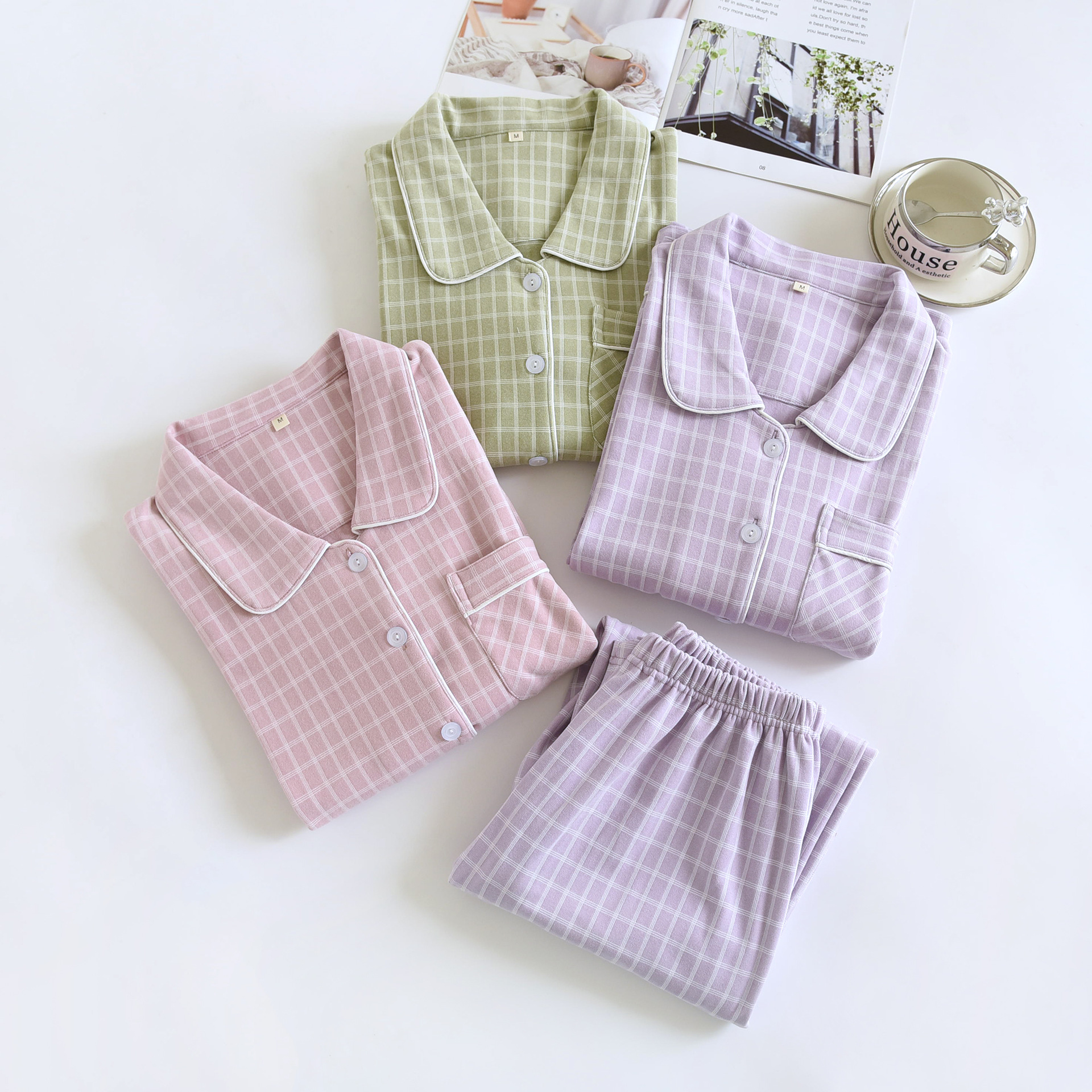 春と秋の冬の新型デコルテのカップルの長袖のズボンの家庭服は簡単でカジュアルな大きいサイズの男性の女性のパジャマのスーツです。