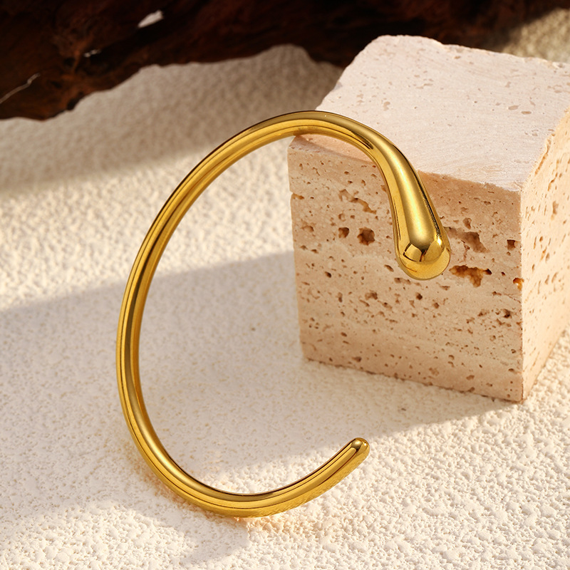 2024 pulsera abierta de fundición de acero inoxidable, pulsera de textura redonda, joyería de acero de titanio de oro de 18 quilates al por mayor