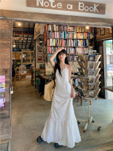 白色重工镂空刺绣花朵连衣裙女2025夏季新款气质显瘦别致吊带长裙