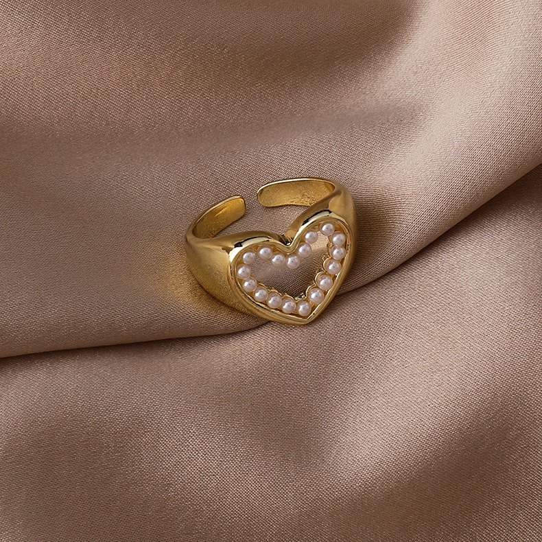 Retro Hollow Pearl Heart Open Ring display picture 2